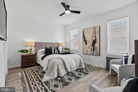a bed room with a bed and a couch
