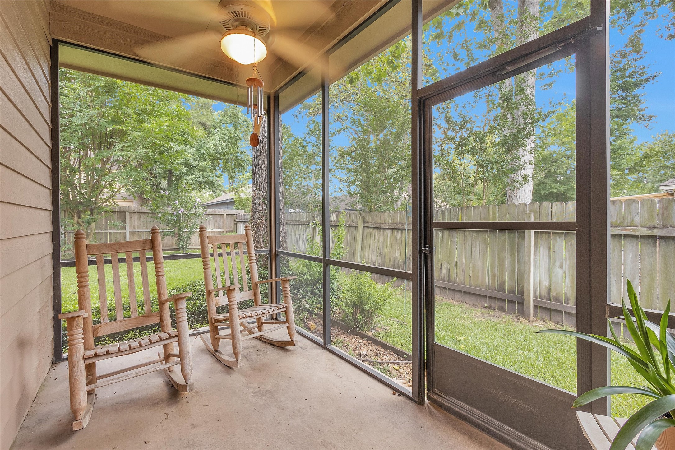 529 Stephen F Austin Drive Conroe, TX 77302 - Photo 37 of 37 a view of a room with wooden floor and windows