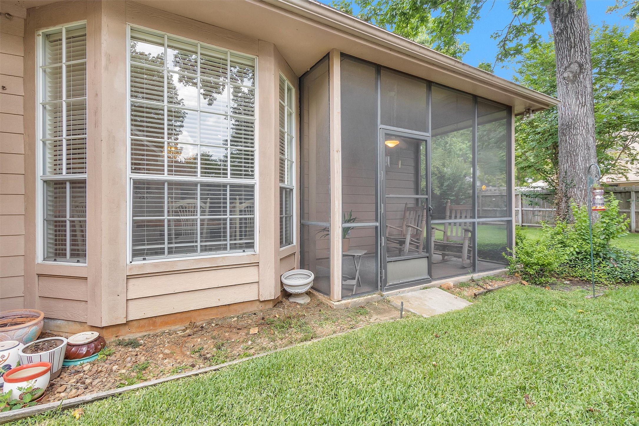 529 Stephen F Austin Drive Conroe, TX 77302 - Photo 6 of 37 a view of a backyard with a garden