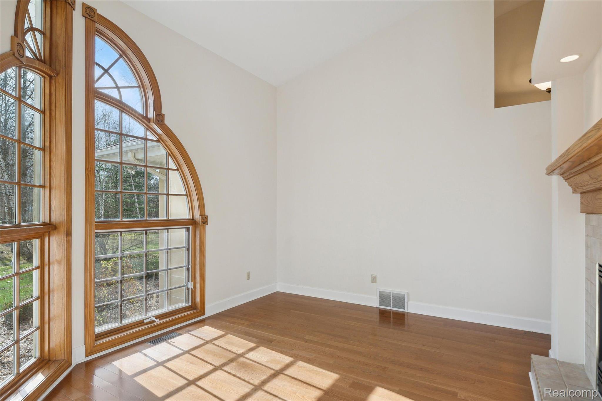 5240 Davis Road St. Clair, MI 48079 - Photo 13 of 69 Built-in shelving surrounds the office fireplace