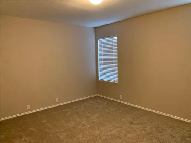 a view of kitchen with cabinets and wooden floor
