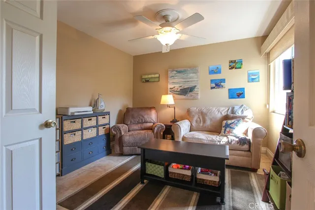 a bathroom with a sink a toilet and a window
