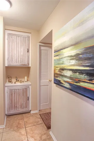 a utility room with sink dryer and washer