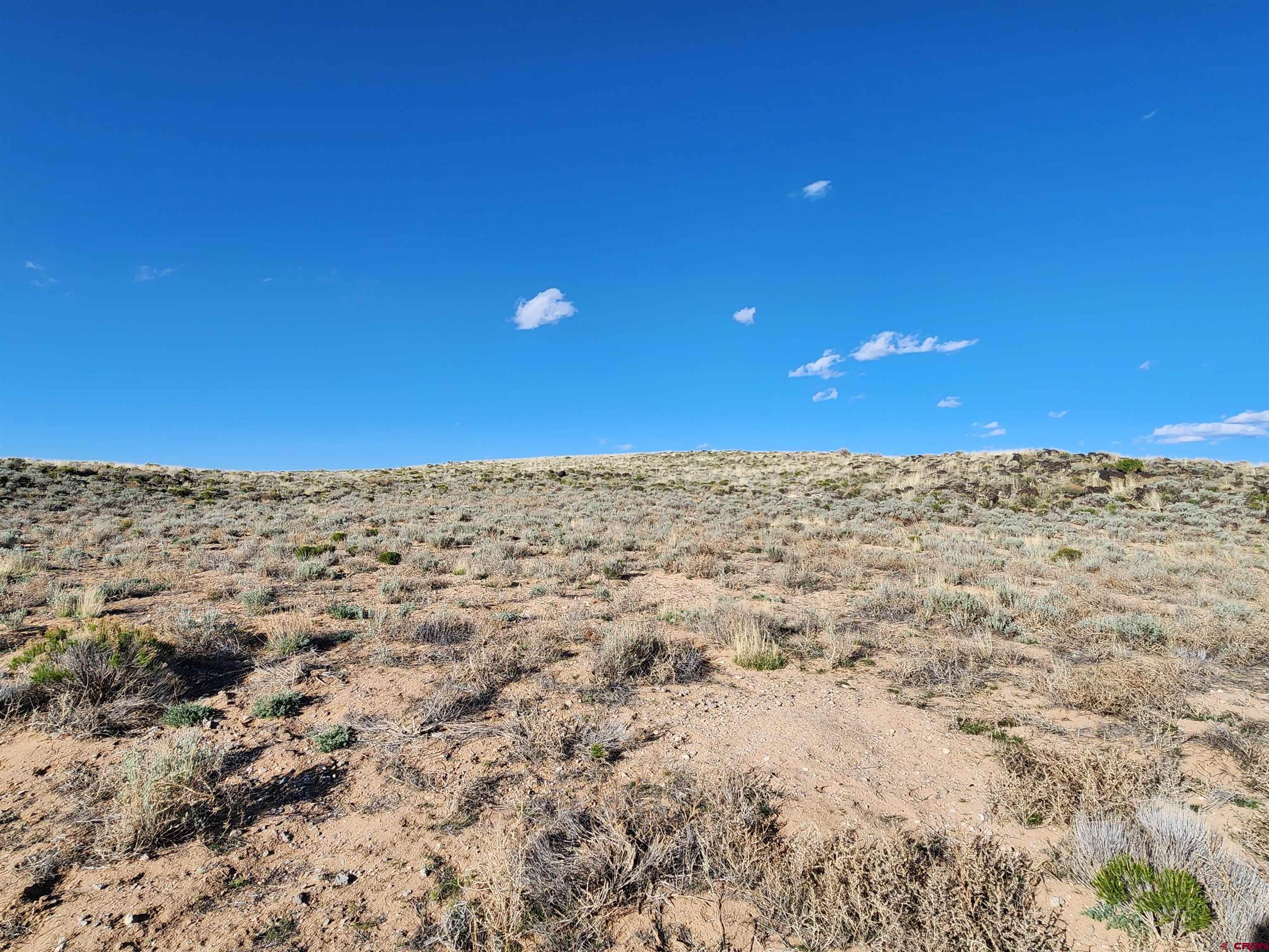 0 County Rd H San Luis, CO 81152 - Photo 5 of 11 a view of a field with a mountain in the background