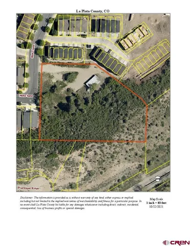 an aerial view of a city with lots of residential buildings and ocean view