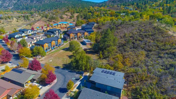 a view of a backyard with green space