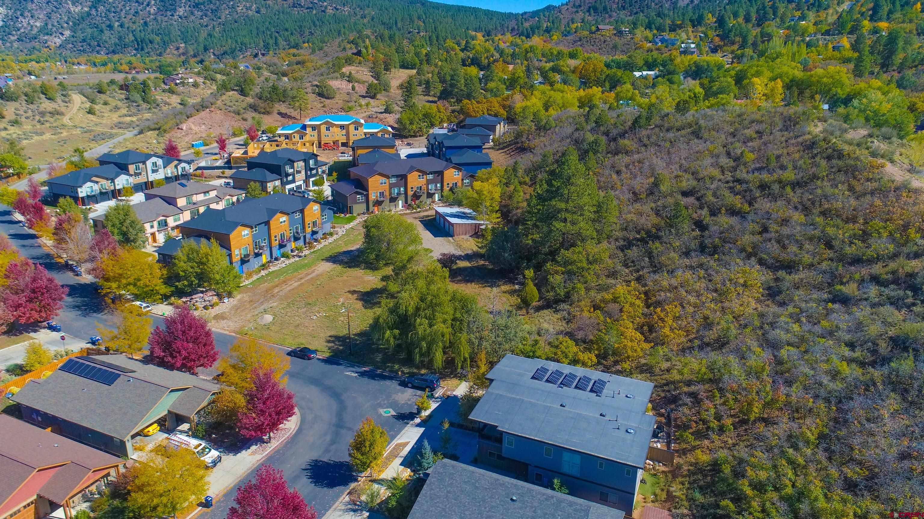 170 Metz Lane Durango, CO 81301 - Photo 3 of 9 an aerial view of a city with lots of residential buildings and ocean view