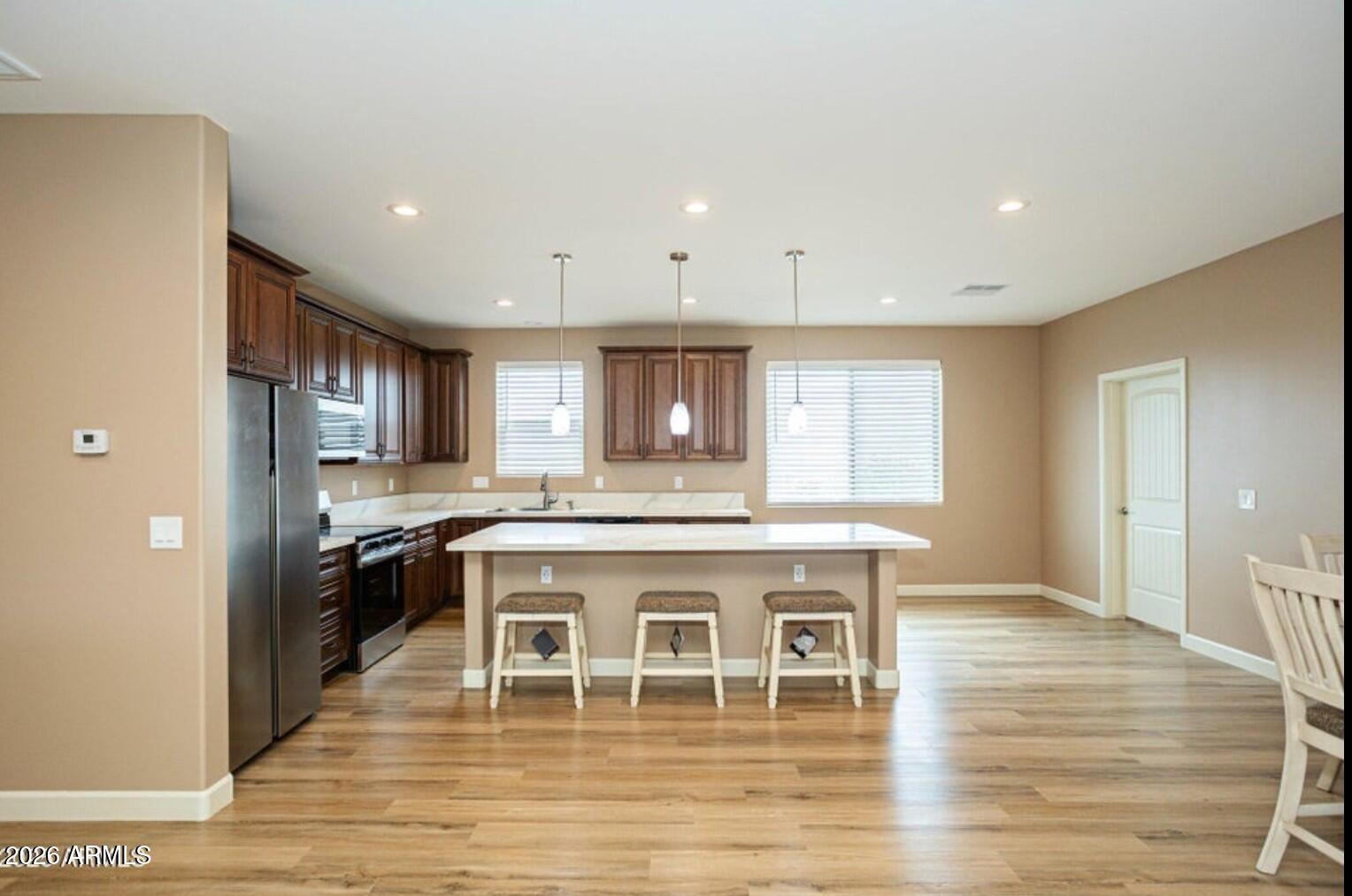 4695 Kerry Drive Rimrock, AZ 86335 - Photo 16 of 47 a kitchen with a stove and a refrigerator