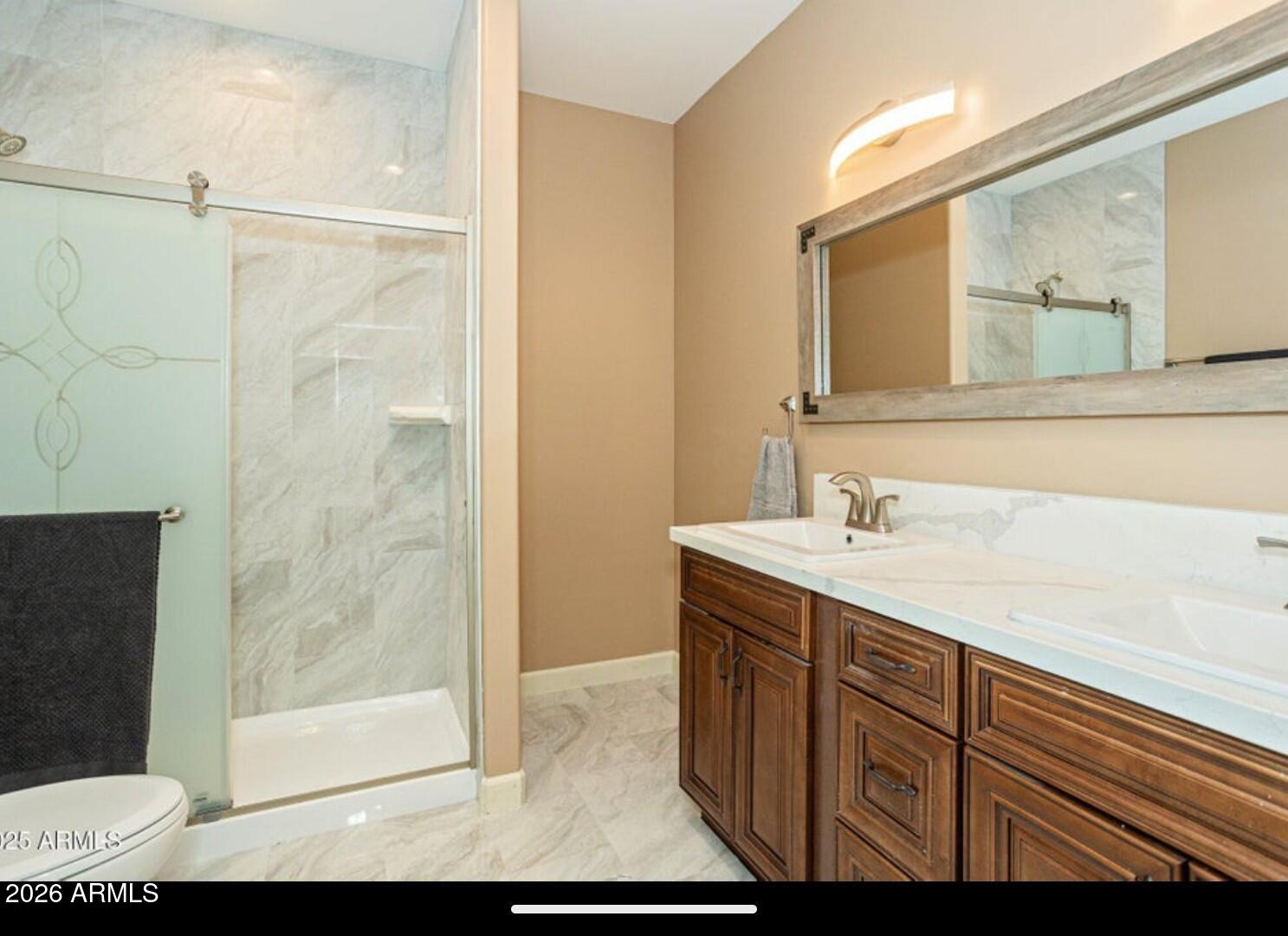 4695 Kerry Drive Rimrock, AZ 86335 - Photo 25 of 47 a bathroom with a sink and a mirror