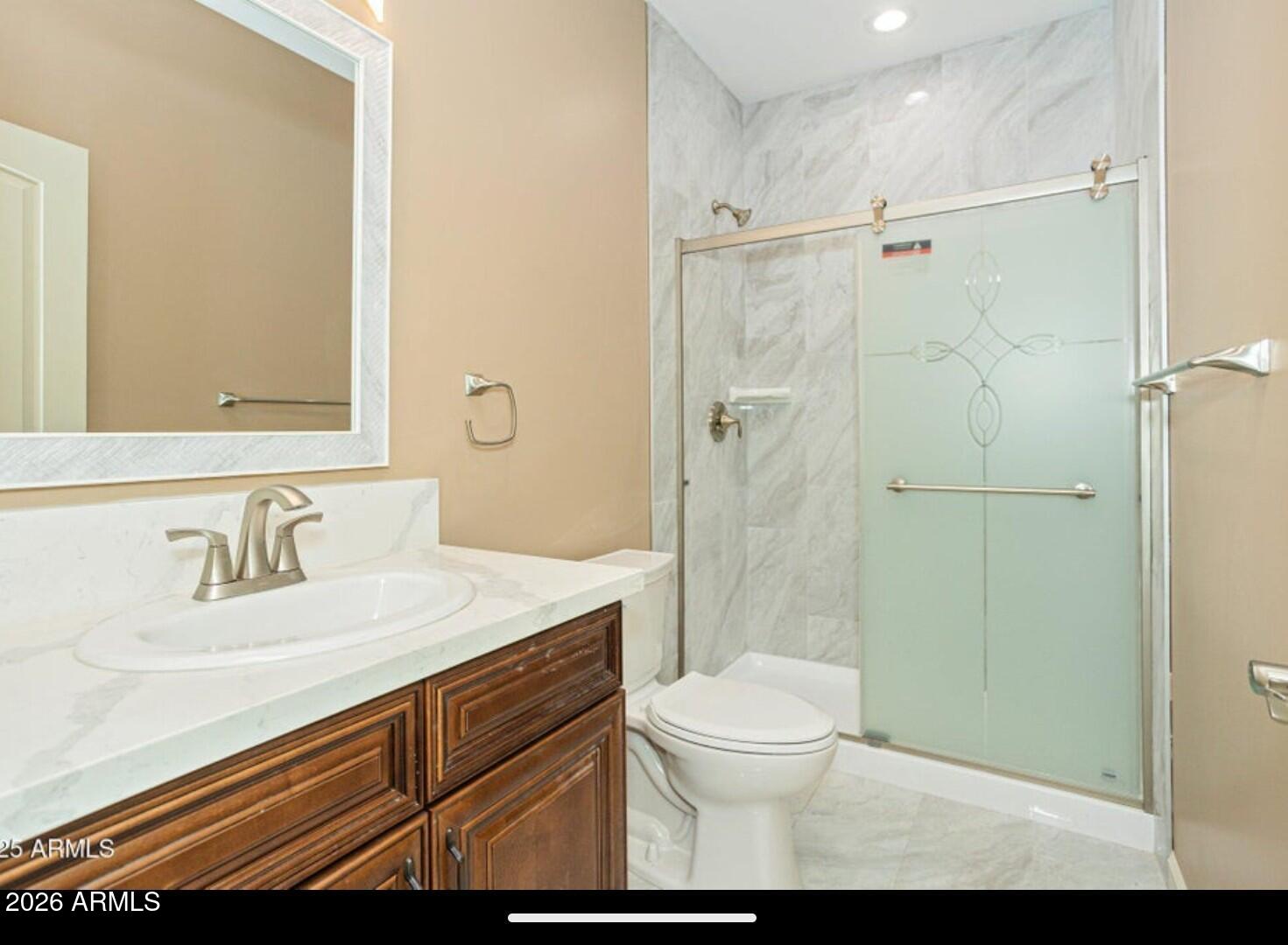 4695 Kerry Drive Rimrock, AZ 86335 - Photo 31 of 47 a bathroom with a sink a toilet and shower