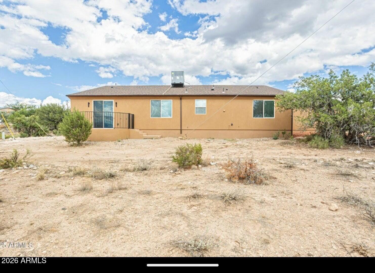 4695 Kerry Drive Rimrock, AZ 86335 - Photo 42 of 47 a front view of a house with a yard