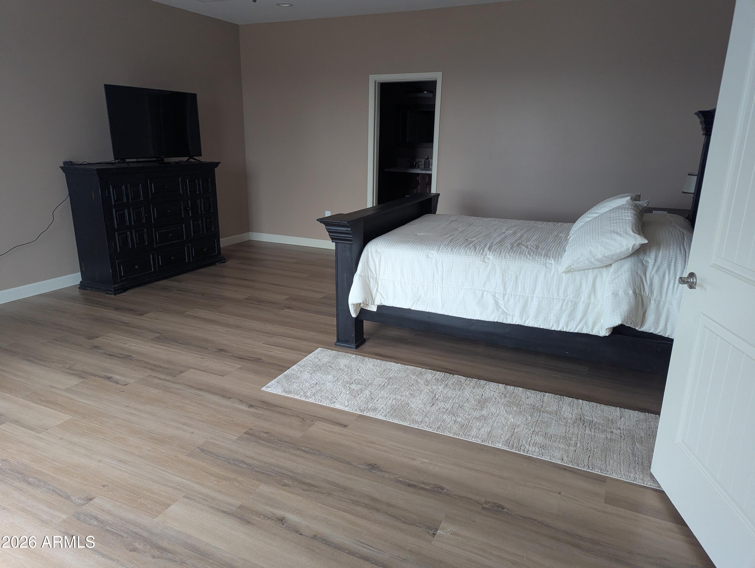 4695 Kerry Drive Rimrock, AZ 86335 - Photo 45 of 47 a bedroom with a bed and a television