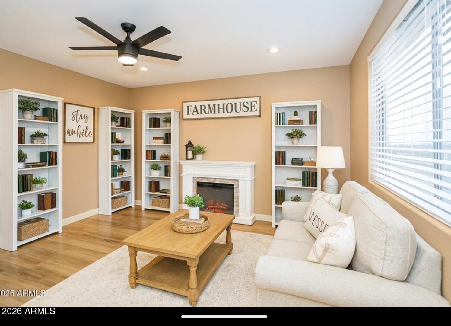 4695 Kerry Drive Rimrock, AZ 86335 - Photo 6 of 47 a living room with furniture and a fireplace