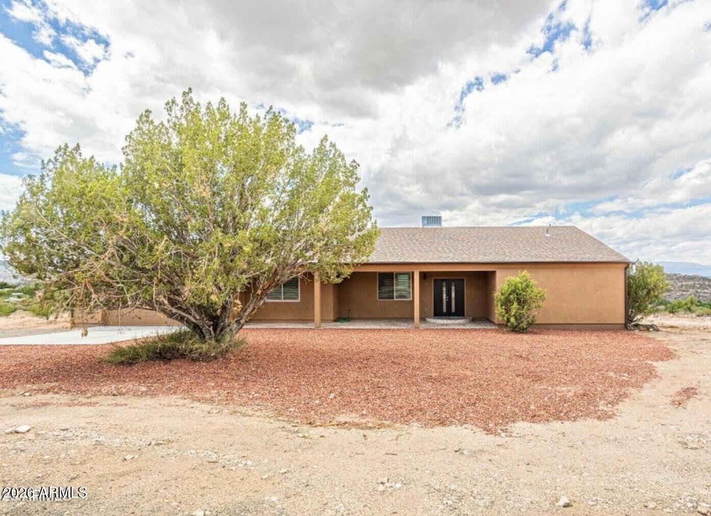 4695 Kerry Drive Rimrock, AZ 86335 - Photo 10 of 47 a front view of house with yard and trees around
