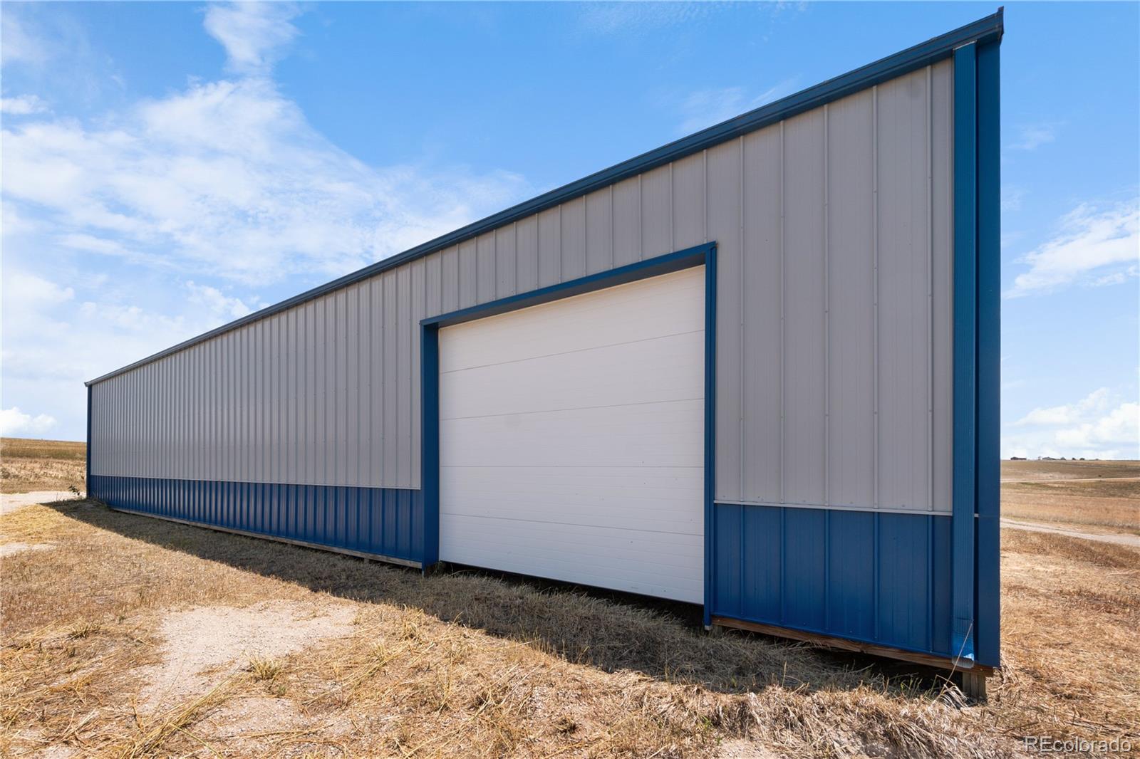 13201 Cavanaugh Road Hudson, CO 80642 - Photo 39 of 41 a backyard of a house