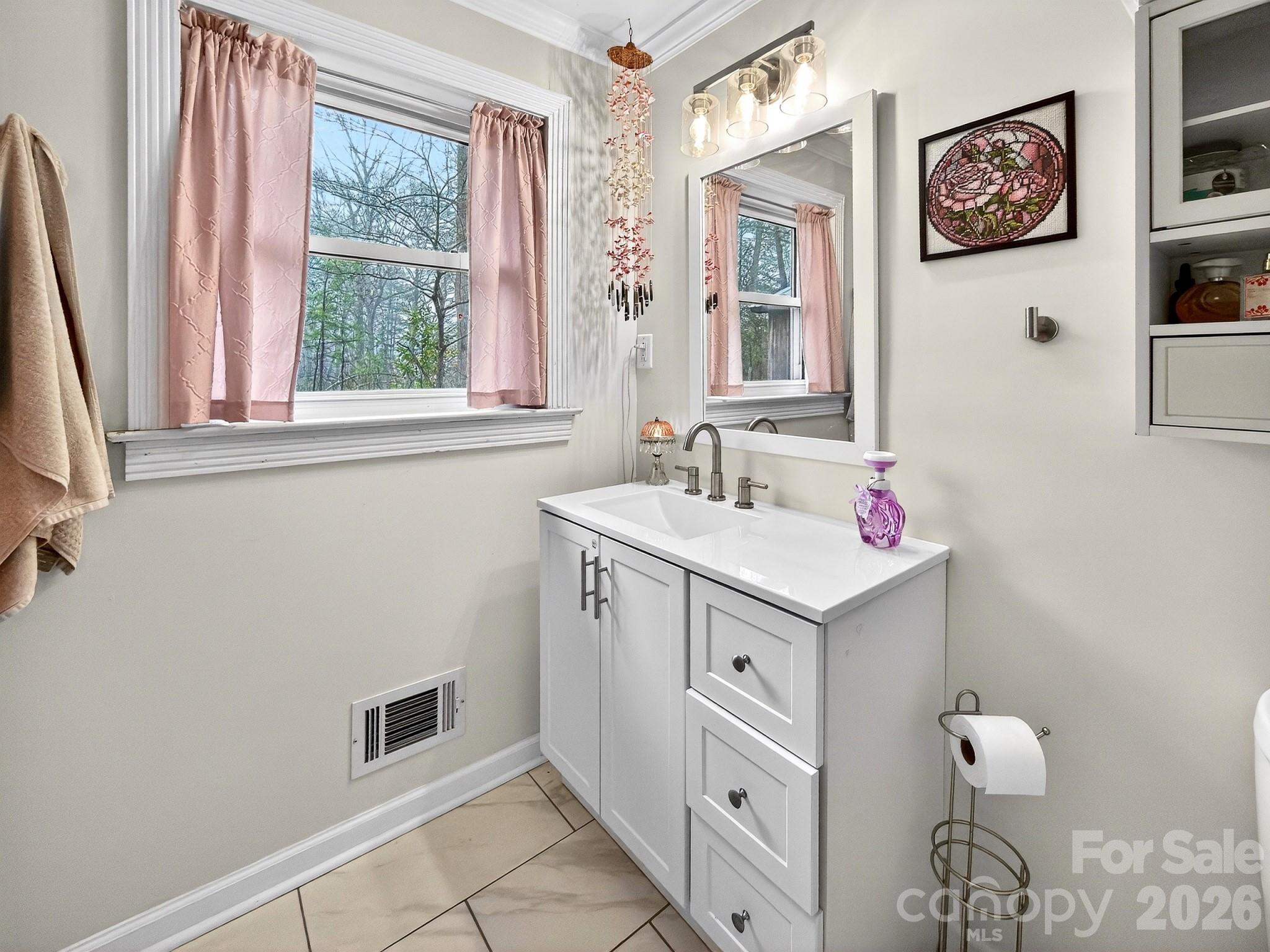 1137 Gilboa Church Road Rutherfordton, NC 28139 - Photo 17 of 21 a bathroom with a sink and a mirror