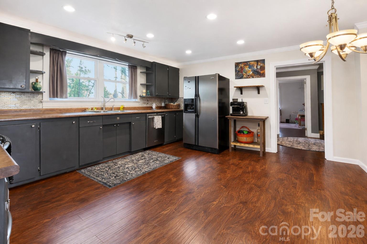 1137 Gilboa Church Road Rutherfordton, NC 28139 - Photo 7 of 21 a kitchen with stainless steel appliances granite countertop a refrigerator and a sink