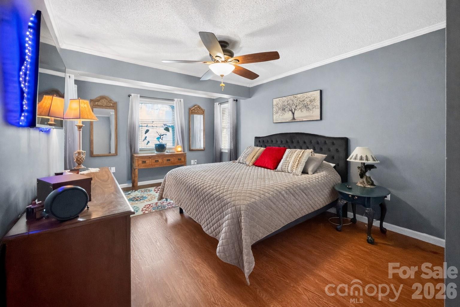 1137 Gilboa Church Road Rutherfordton, NC 28139 - Photo 10 of 21 a bedroom with a bed and wooden floor