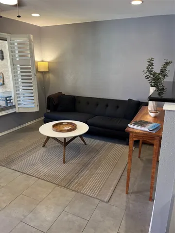 a workspace with furniture and window