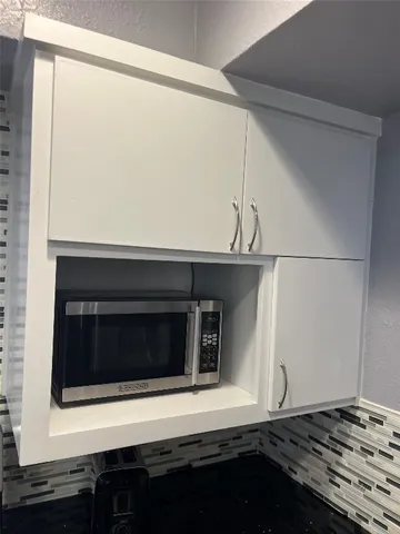 a view of a house with a street