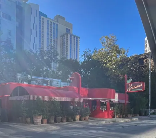 a view of a store with parking