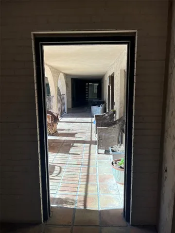 a kitchen with stainless steel appliances kitchen island granite countertop a sink and cabinets