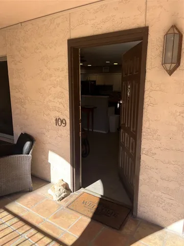 a kitchen with stainless steel appliances a refrigerator a stove and a sink