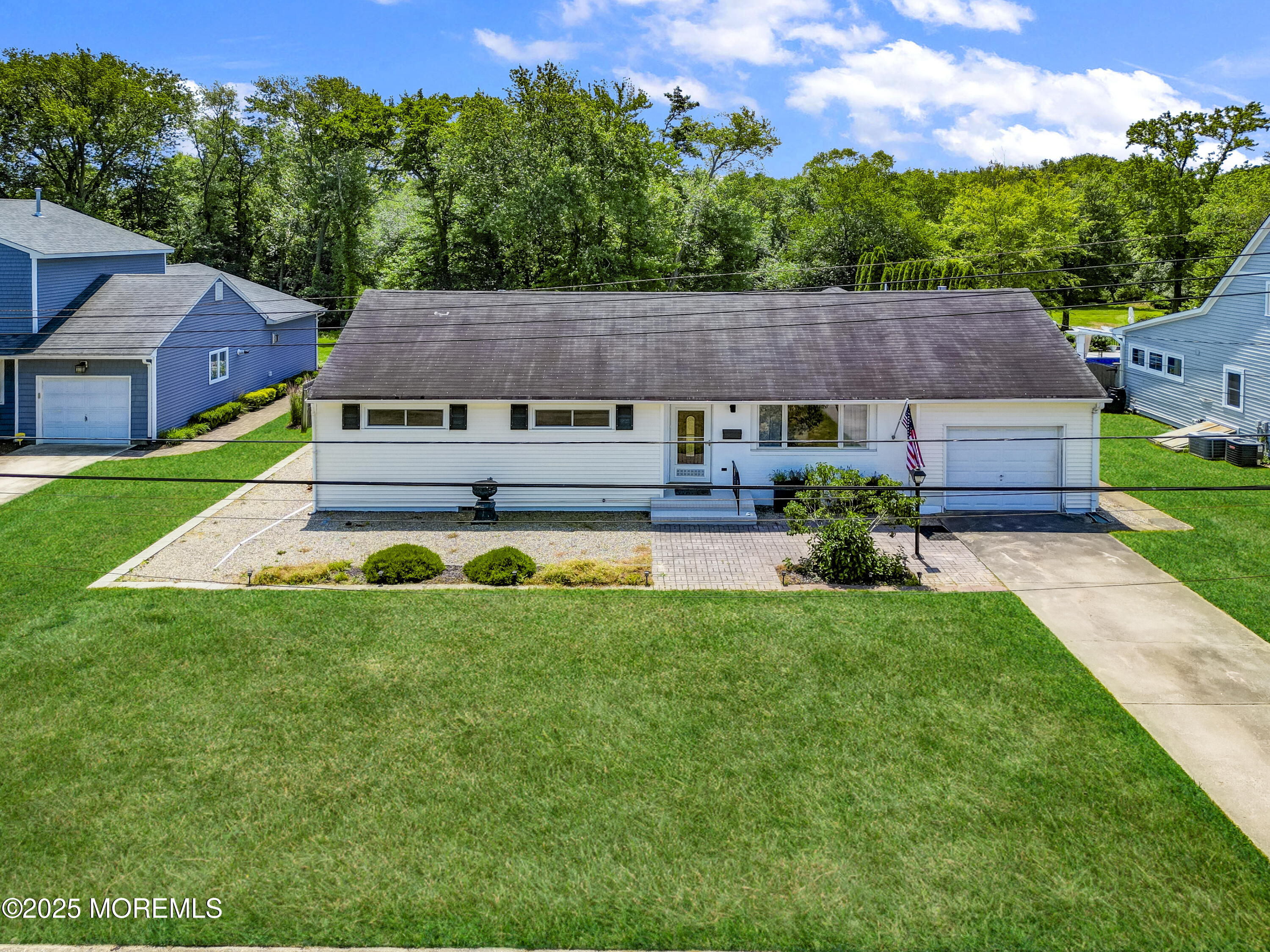 1007 Shore Road Spring Lake Heights, NJ 07762 - Photo 1 of 53 a aerial view of a house with a big yard