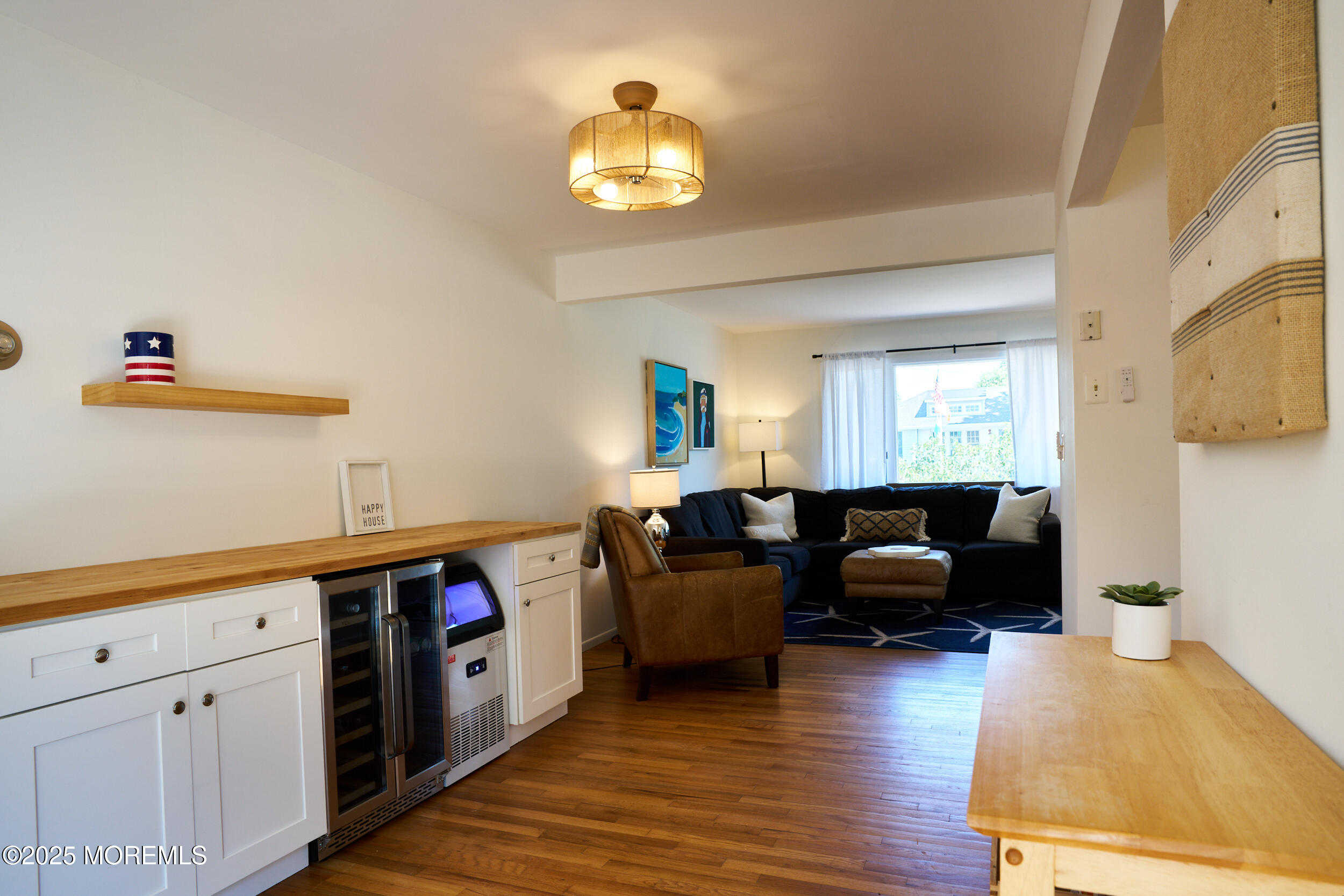 1007 Shore Road Spring Lake Heights, NJ 07762 - Photo 13 of 53 a living room with furniture and a wooden floor