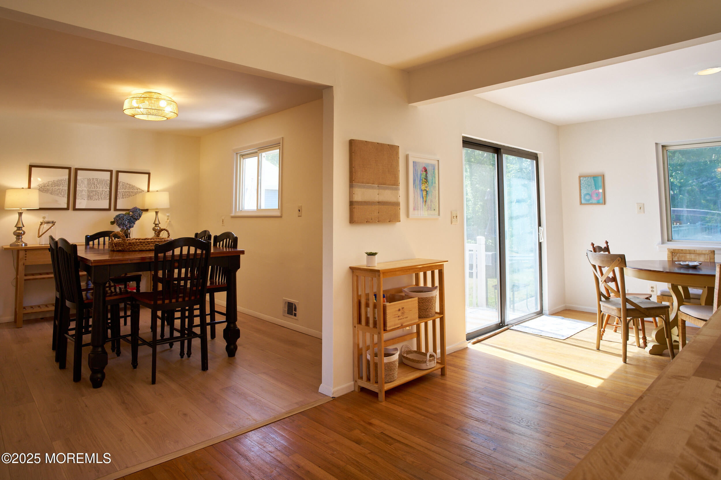 1007 Shore Road Spring Lake Heights, NJ 07762 - Photo 20 of 53 a view of a dining room with furniture and wooden floor