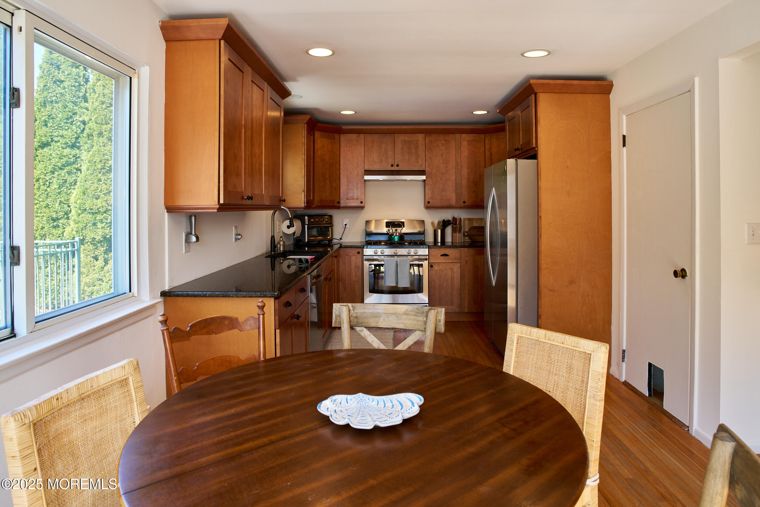 1007 Shore Road Spring Lake Heights, NJ 07762 - Photo 22 of 53 a kitchen with stainless steel appliances granite countertop a refrigerator a stove and a sink with granite countertops