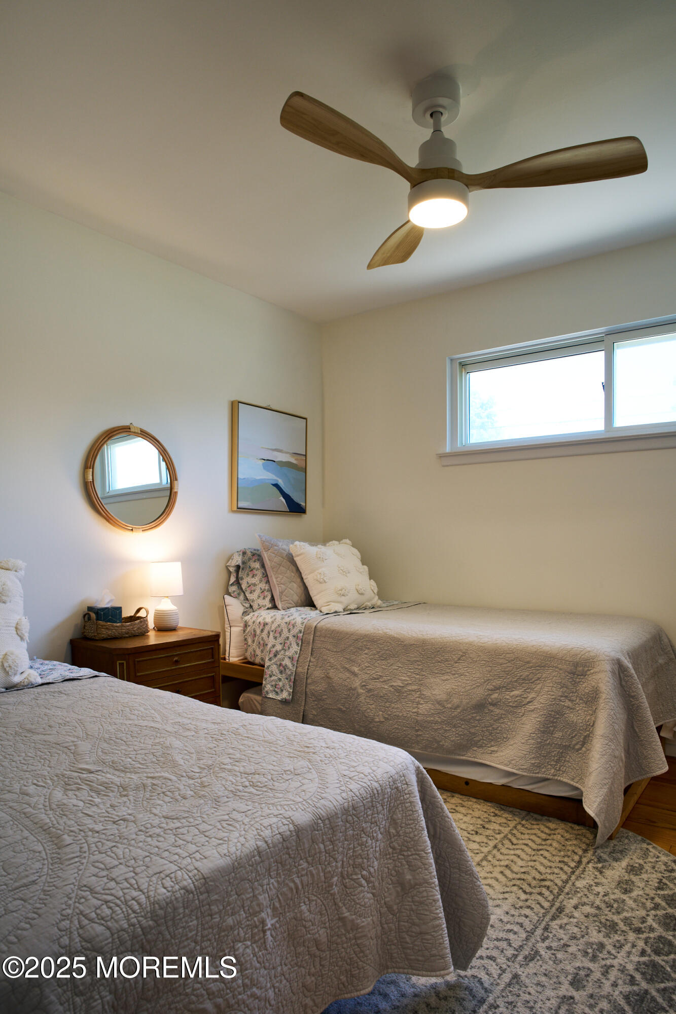 1007 Shore Road Spring Lake Heights, NJ 07762 - Photo 28 of 53 a bedroom with a bed and a large mirror