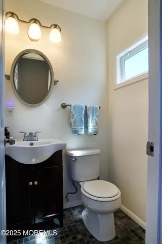 a bedroom with a bed and a table