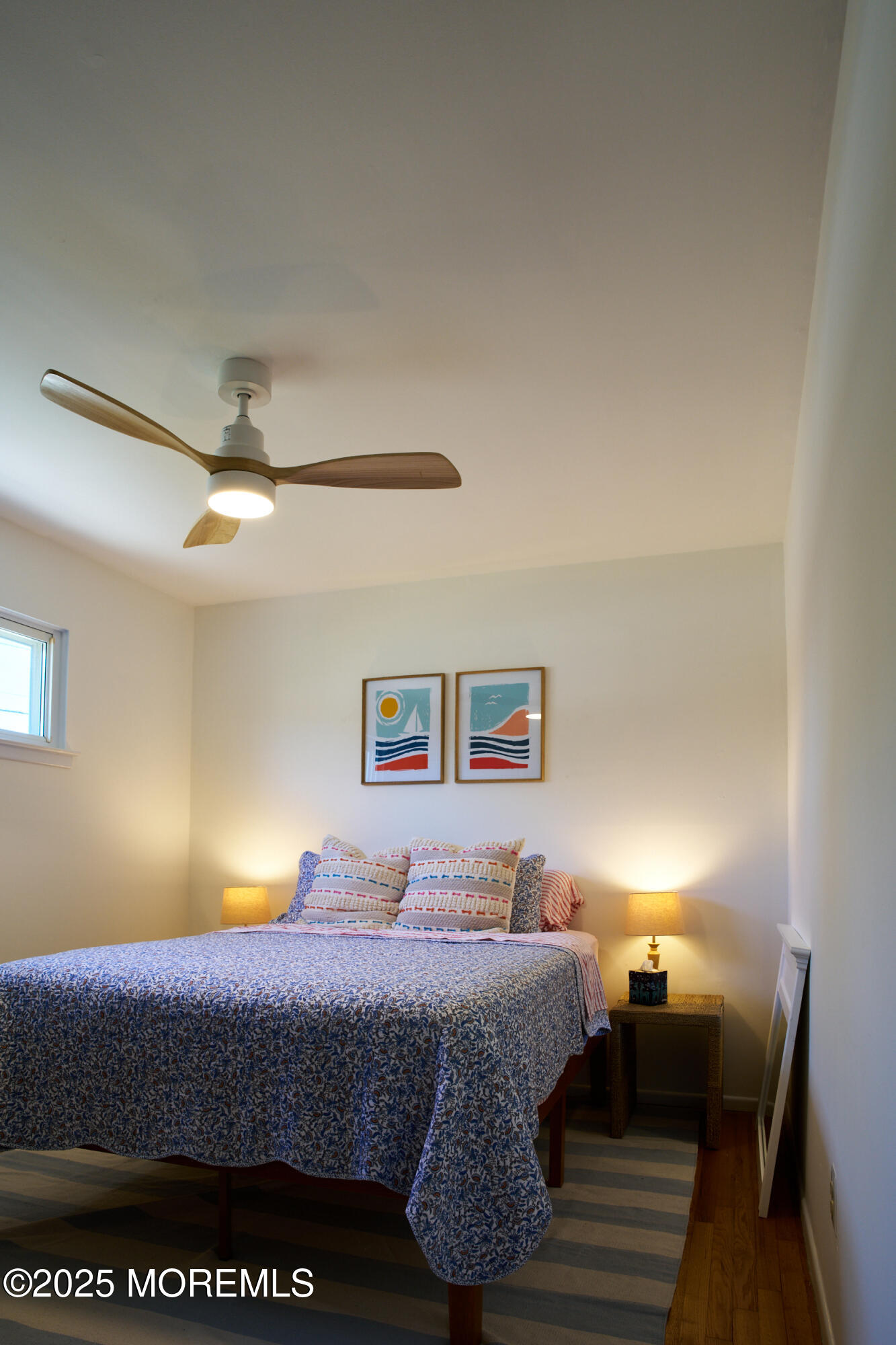 1007 Shore Road Spring Lake Heights, NJ 07762 - Photo 34 of 53 a bedroom with a bed and wooden floor