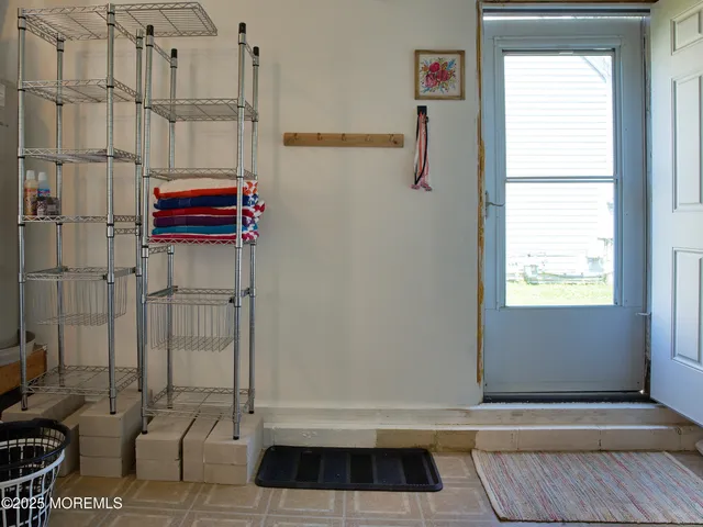 a view of outdoor sitting area with furniture