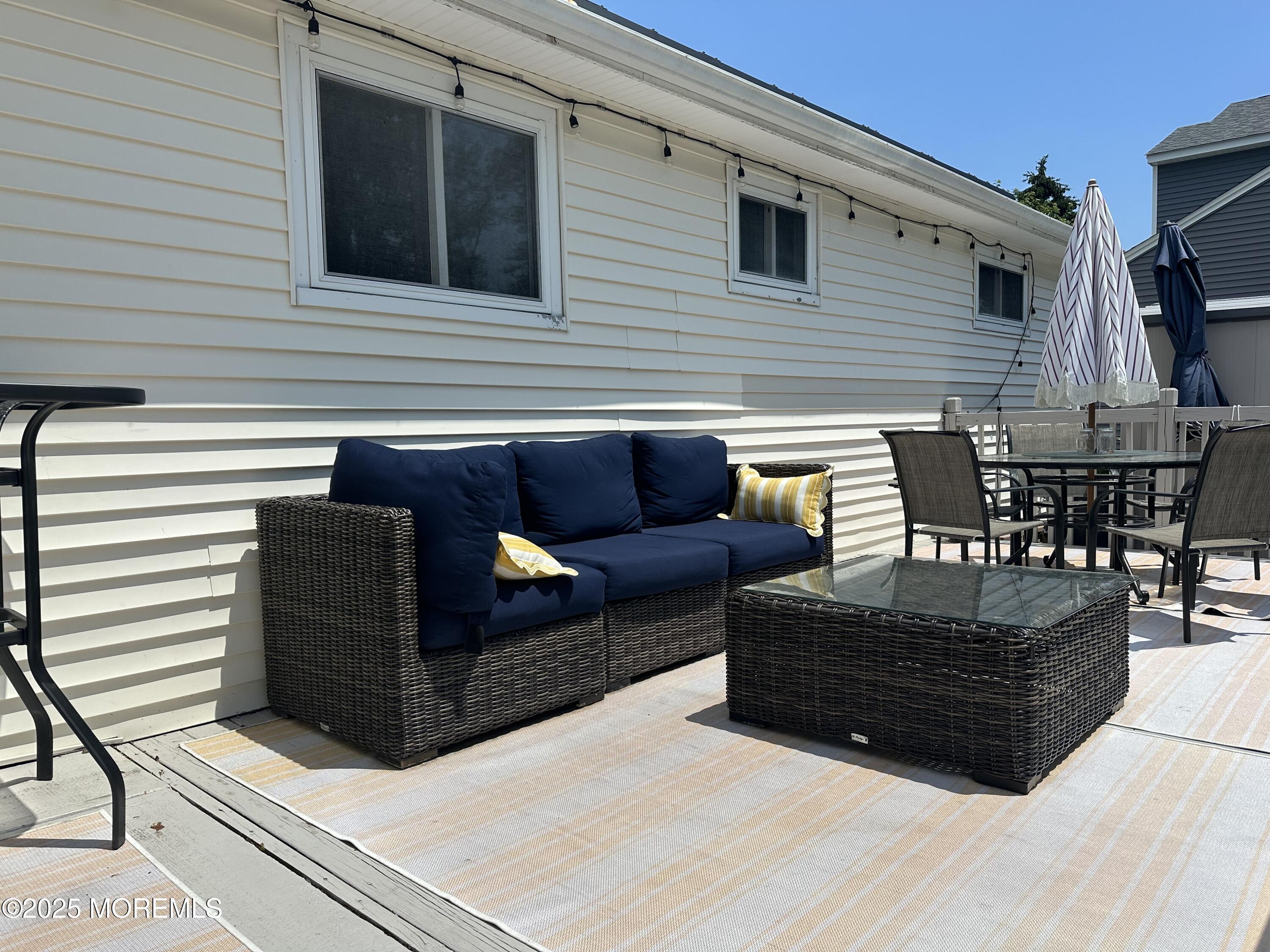 1007 Shore Road Spring Lake Heights, NJ 07762 - Photo 38 of 53 a view of outdoor sitting area with furniture