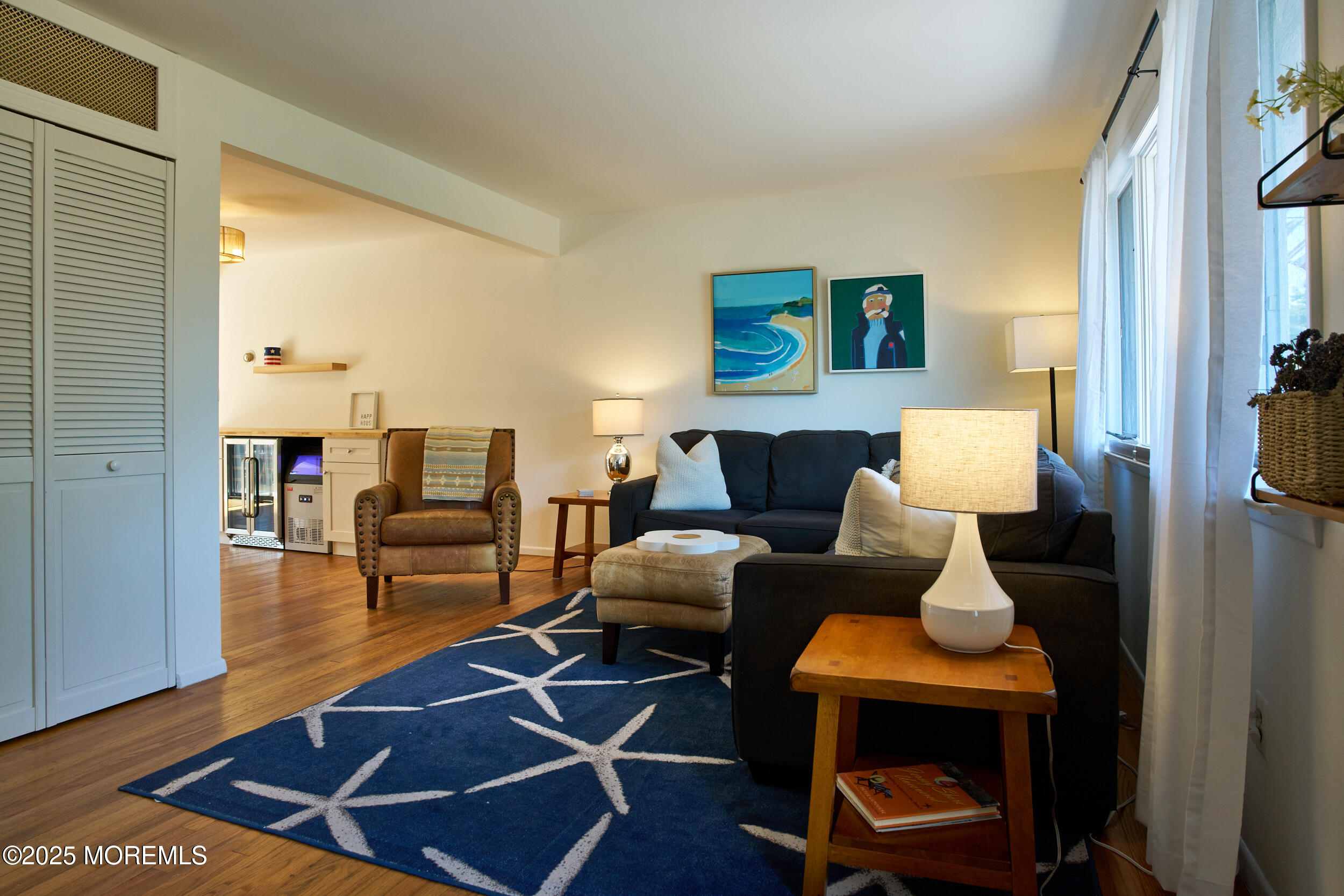 1007 Shore Road Spring Lake Heights, NJ 07762 - Photo 10 of 53 a living room with furniture and a table