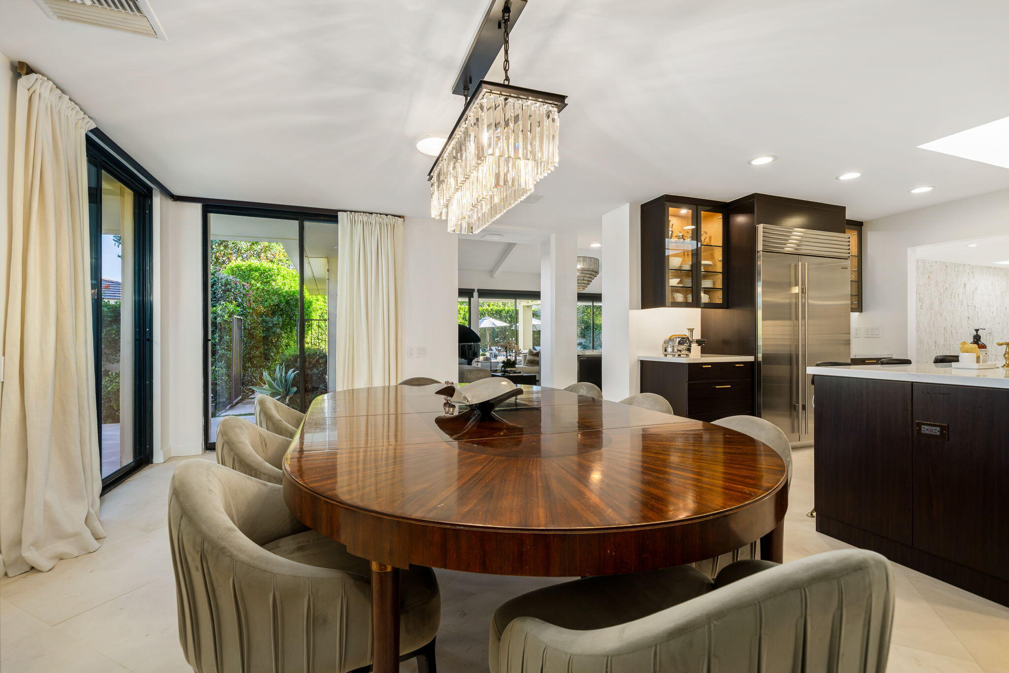 6 Exeter Court Rancho Mirage, CA 92270 - Photo 19 of 54 a dining room with furniture and window