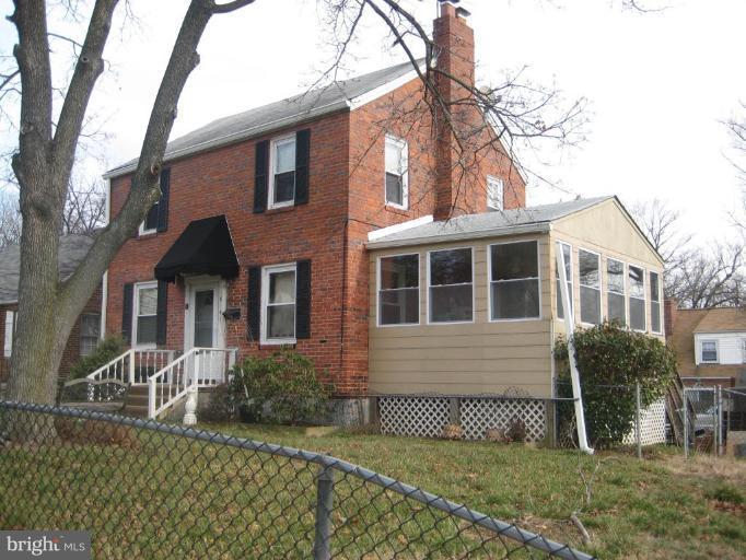 10141 Sutherland Road Silver Spring, MD 20901 - Photo 1 of 11 front view of a house