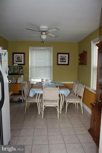 10141 Sutherland Road Silver Spring, MD 20901 - Photo 7 of 11 a view of a dining room with furniture