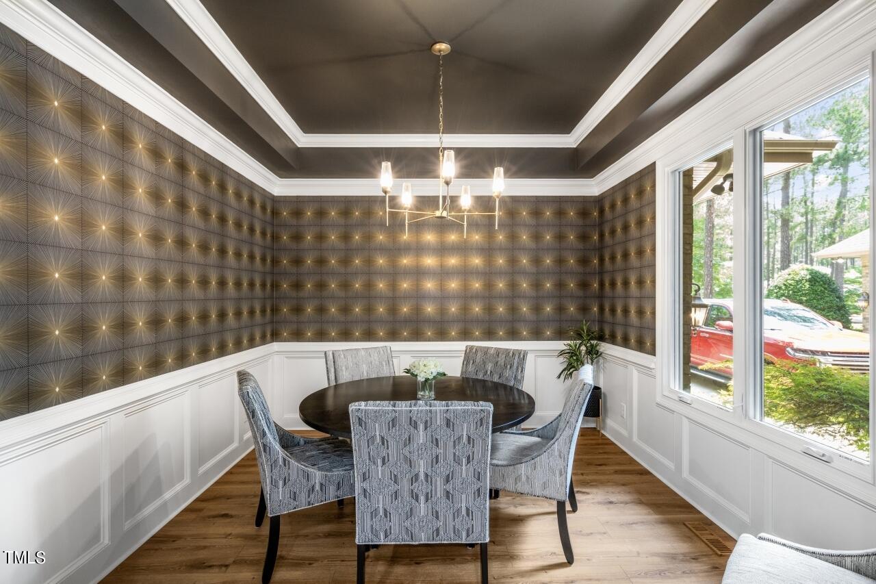 19 Pinewild Drive Pinehurst, NC 28374 - Photo 15 of 44 a dining room with furniture and window