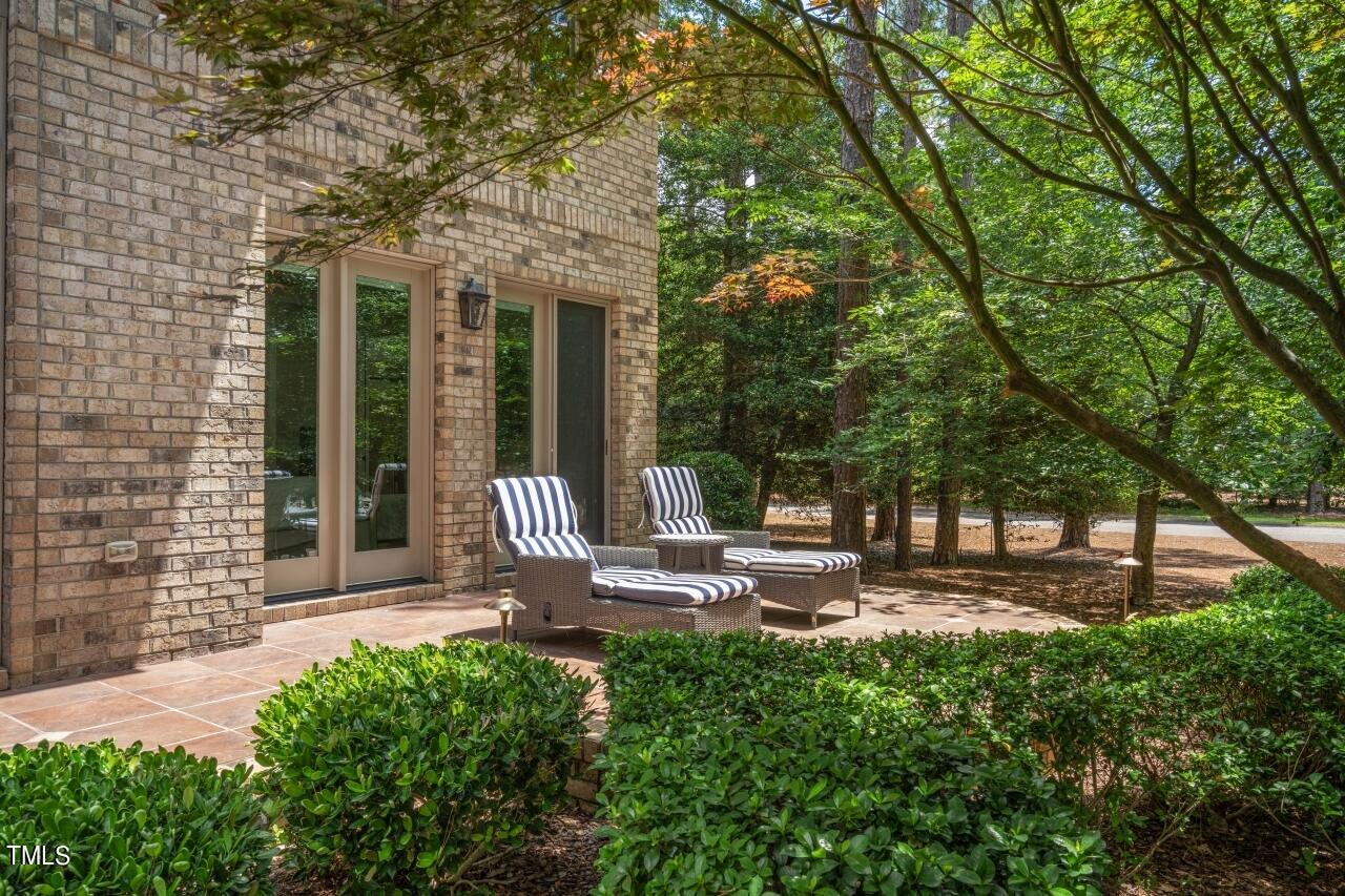 19 Pinewild Drive Pinehurst, NC 28374 - Photo 38 of 44 a front view of a house with garden