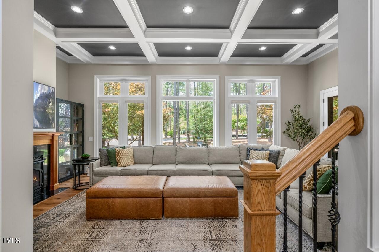 19 Pinewild Drive Pinehurst, NC 28374 - Photo 4 of 44 a living room with furniture and a floor to ceiling window
