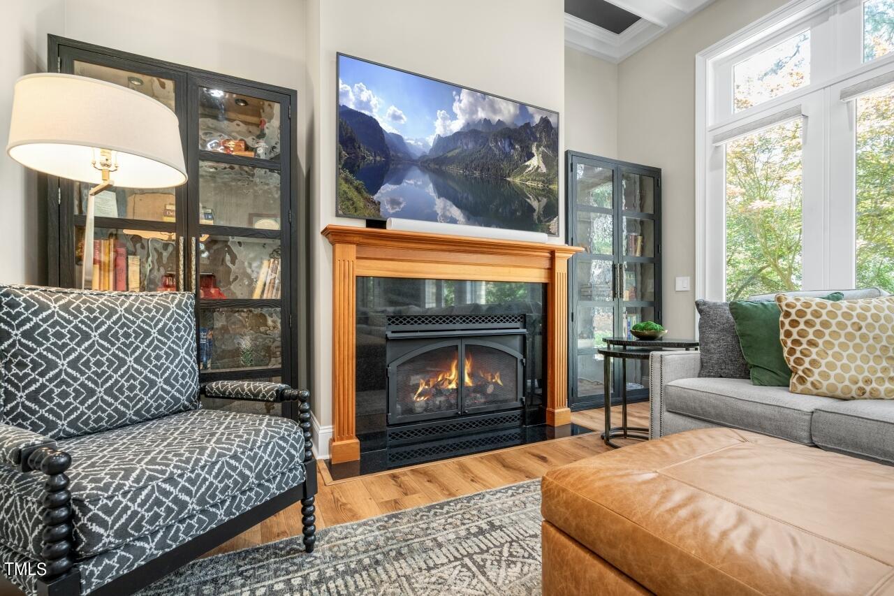 19 Pinewild Drive Pinehurst, NC 28374 - Photo 6 of 44 a living room with furniture and a fireplace