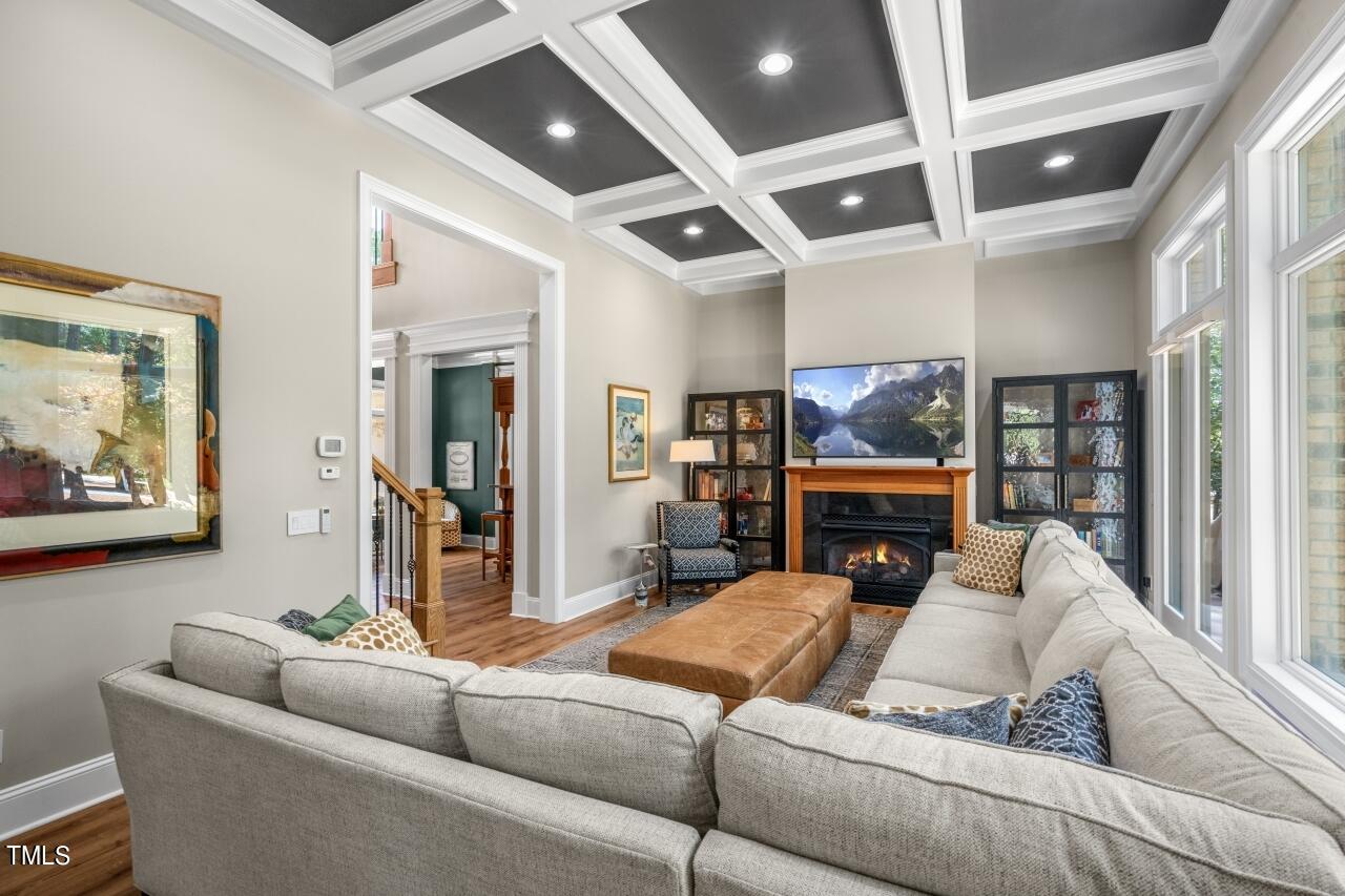 19 Pinewild Drive Pinehurst, NC 28374 - Photo 7 of 44 a living room with furniture and a floor to ceiling window