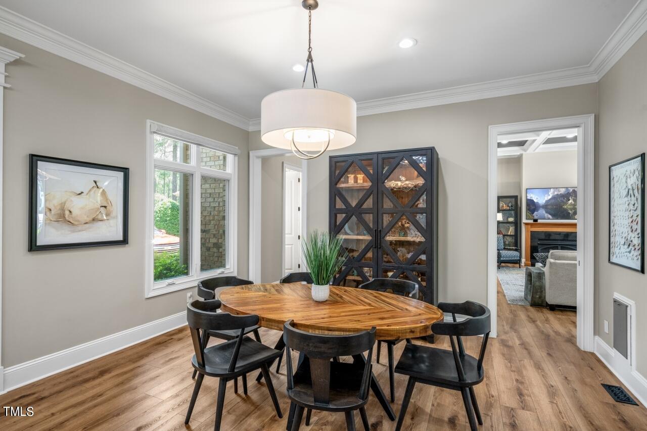 19 Pinewild Drive Pinehurst, NC 28374 - Photo 10 of 44 a view of a dining room with furniture window and wooden floor
