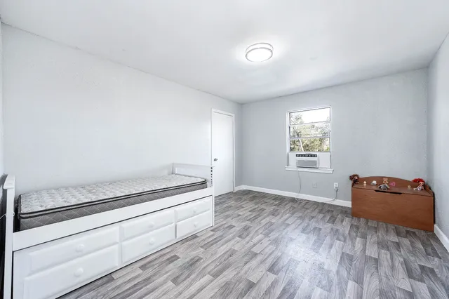 a view of an empty room and window