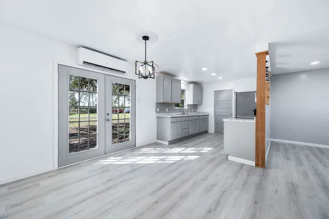 a view of kitchen with wooden floor