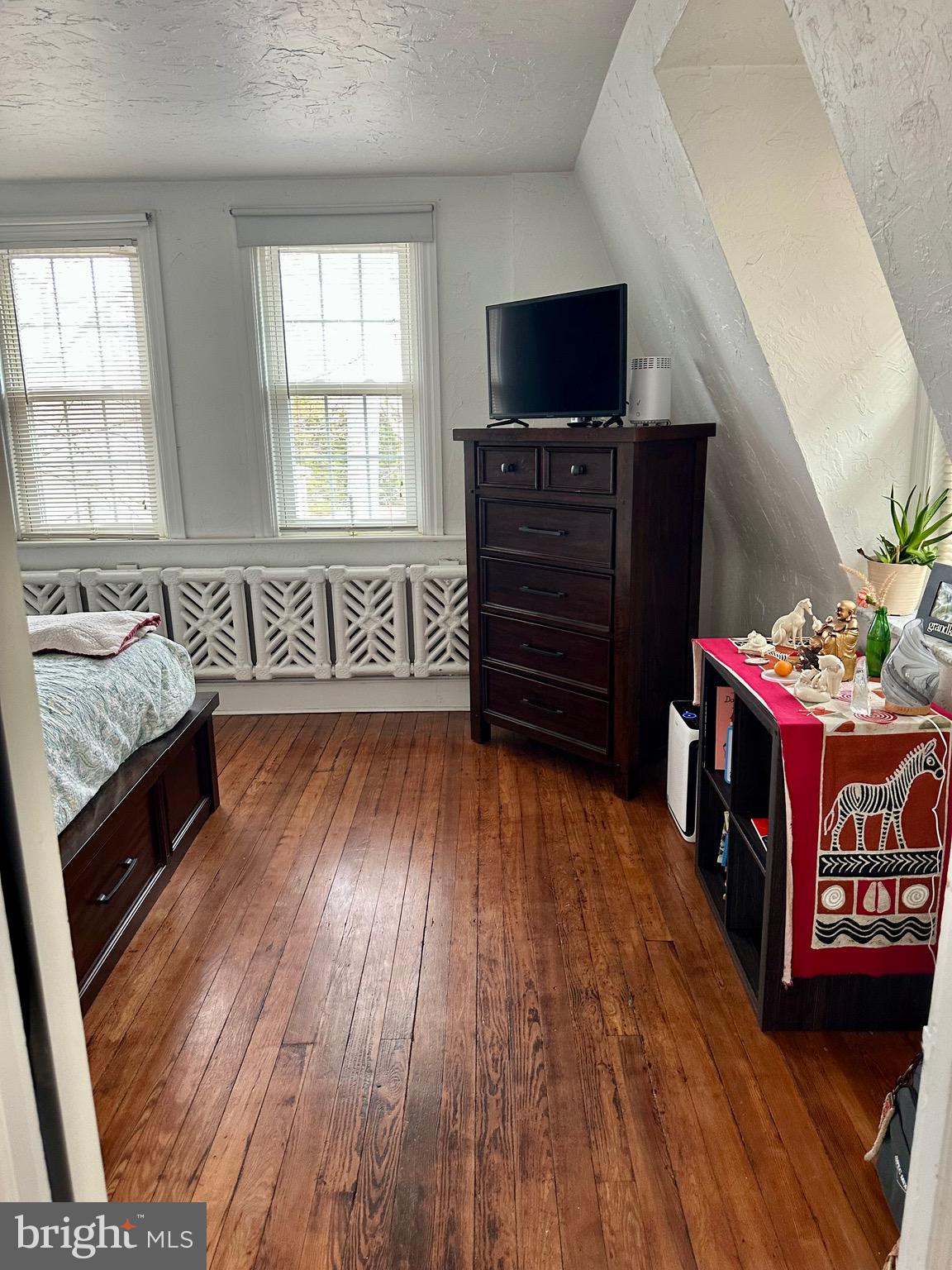 1 West Street, Unit 414 Media, PA 19063 - Photo 16 of 20 a living room with furniture and a flat screen tv