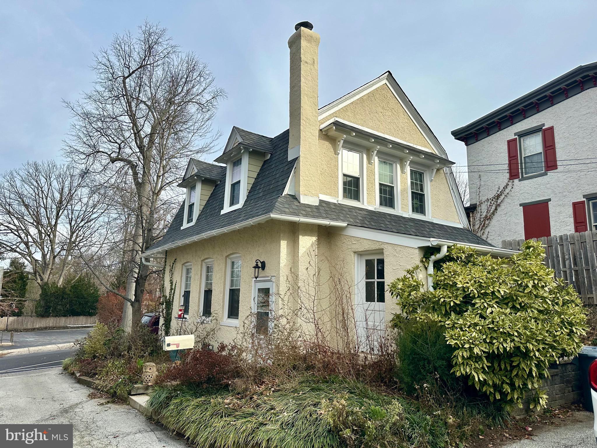 1 West Street, Unit 414 Media, PA 19063 - Photo 2 of 20 a view of a white house next to a yard